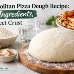 Neapolitan pizza dough recipe with four ingredients and a flour-dusted dough ball for a perfect crust.