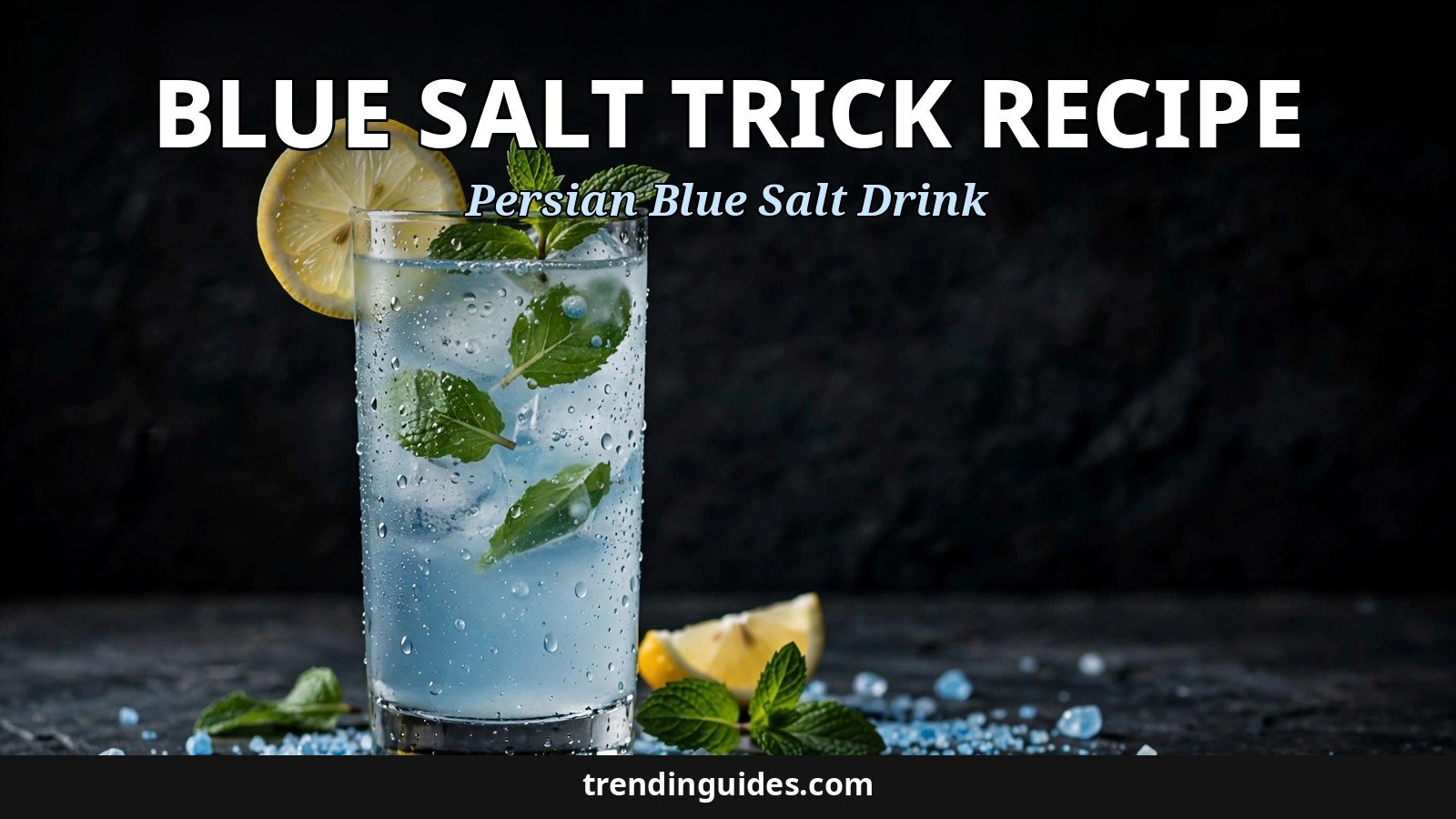 Glass of blue salt trick drink with lemon and mint beside Persian blue salt crystals